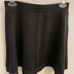 A superdry black mini skirt
